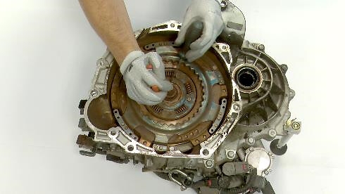 STEP 3 -  Remove the snap ring from the upper hub of DDC package with the snap ring pliers