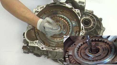 STEP 5 - Remove the 2nd snap ring from the shaft with a screwdriver