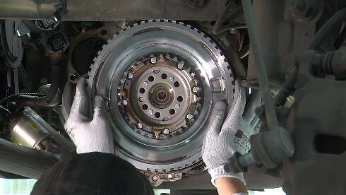 STEP 3 - Position the new flywheel tightening manually  the bolts M10x1