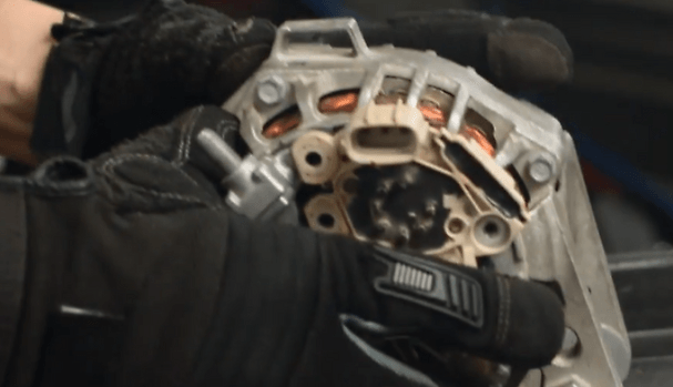 3. Pull out the old alternator from the vehicle.