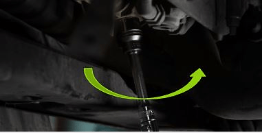 Unscrew the drain valve by using the socket wrench.